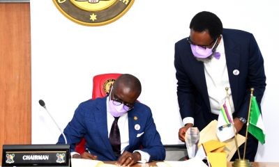 Lagos State Governor, Mr. Babajide Sanwo-Olu signing the Anti-Open grazing bill into law With him is the Attorney General and Commissioner for Justice, Mr. Moyosore Onigbanjo (SAN)